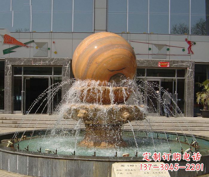 湖州石来运转球晚霞红风水球石雕