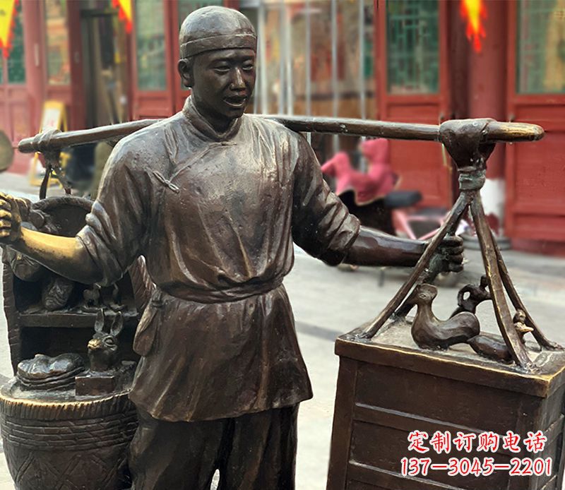 湖州铜雕步行街卖货郎人物雕塑