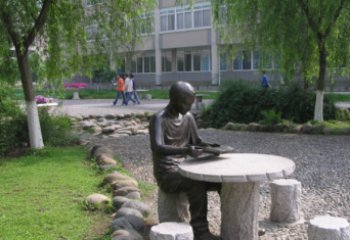 湖州坐石桌凳看书的学生铜雕